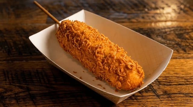 Crispy Ramen Sausage Corndog.